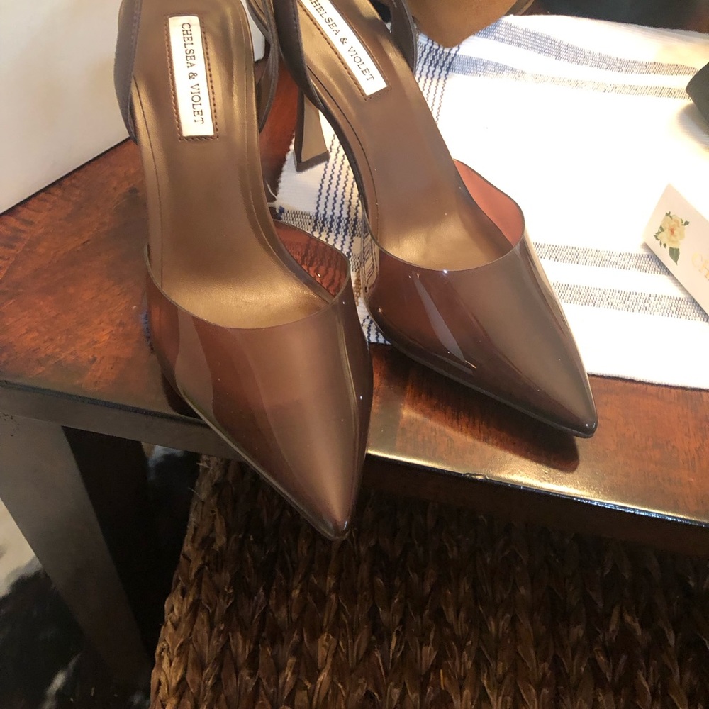 Brand new Chelsea and Violet brown sling back pumps.  Never worn.